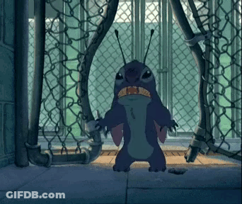 Cartoon Character Chained To Chain Link Fence GIF