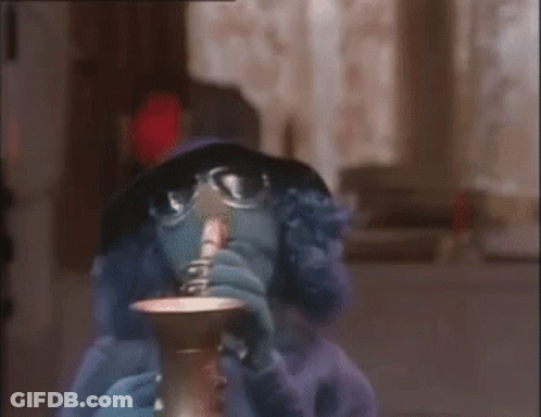 Cartoon Character Drinking From Cup With Glasses And Hat GIF