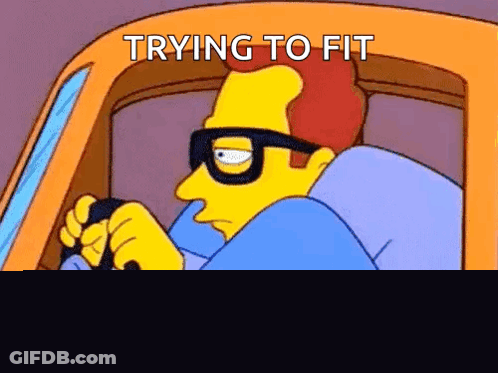 Cartoon Character Driving Car Trying To Fit GIF