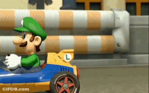 Cartoon Character Driving Race Car GIF