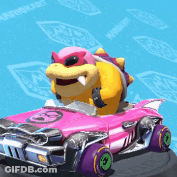 Cartoon Character Driving Red And White Vehicle Near Waterfall GIF