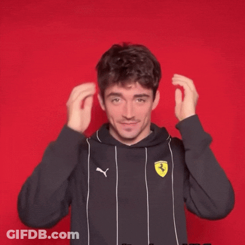 Cartoon Character Driving Red Car With W GIF