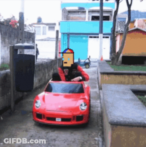 Cartoon Character Driving Red Car With W GIF