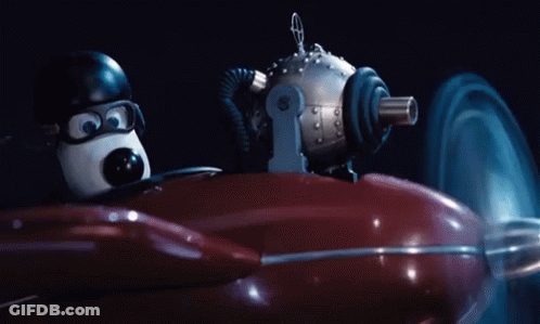 Cartoon Character Driving Red Vehicle GIF