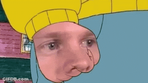 Cartoon Character Face In Yellow Sweater GIF