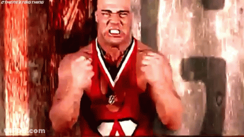 Cartoon Character Flexing Muscles With Heart On Belt GIF