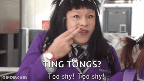 Cartoon Character Giving Thumbs Up With Rubik's Cube GIF