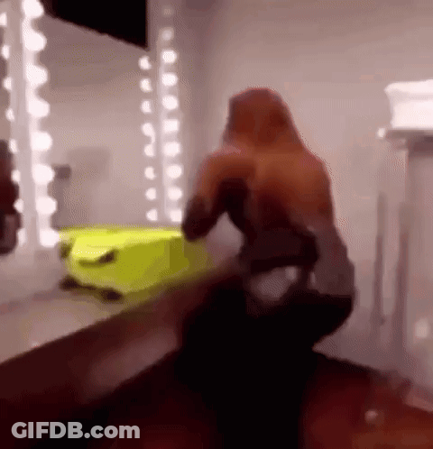 Cartoon Character Holding Baseball Bat At Pentong Pos Ron Building GIF