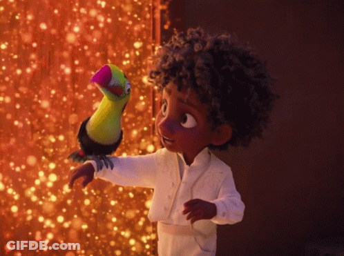 Cartoon Character Holding Colorful Parrot GIF