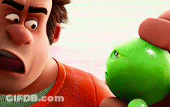 Cartoon Character Holding Green Ball With Face GIF