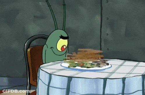 Cartoon Character Holding Knife And Fork At Table GIF
