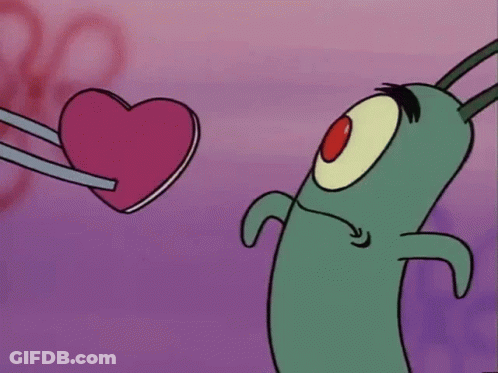 Cartoon Character Holding Pink Heart GIF