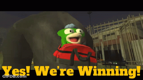 Cartoon Character Holding Red Bag Saying Yes We're Winning GIF