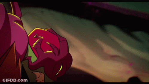 Cartoon Character Holding Red Object With Letter Z GIF