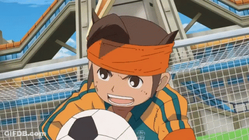 Cartoon Character Holding Soccer Ball With Chinese Characters On Shirt GIF