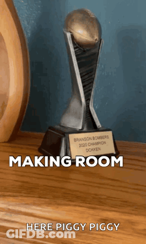 Cartoon Character Holding Two Red Playing Cards By Pile GIF