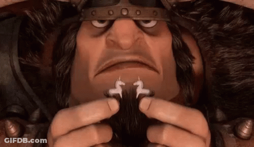 Cartoon Character Holding Unicorn Earrings GIF