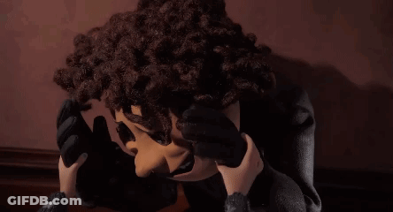 Cartoon Character In Black Jacket And Gloves GIF
