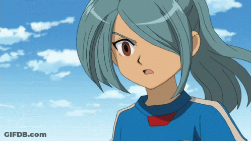 Cartoon Character In Blue Shirt With Red Stripes GIF