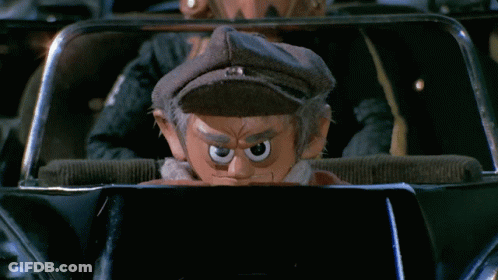 Cartoon Character In Car With Hat GIF