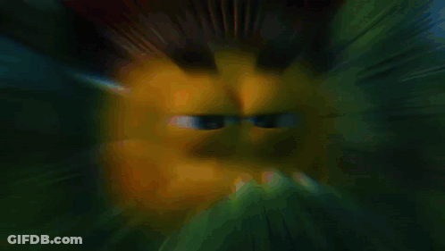 Cartoon Character In Feathered Headdress Smiling Behind Leaves GIF