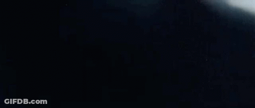 Cartoon Character In Front Of Party Sign GIF