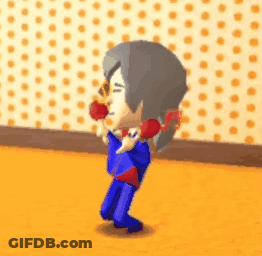Cartoon Character In Front Of Polka Dot Wall Holding Red Object GIF