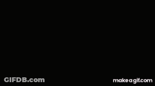 Cartoon Character In Glasses And Gray Shirt GIF