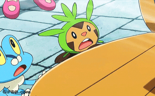 Cartoon Character In Green Hat Laying On Ground GIF