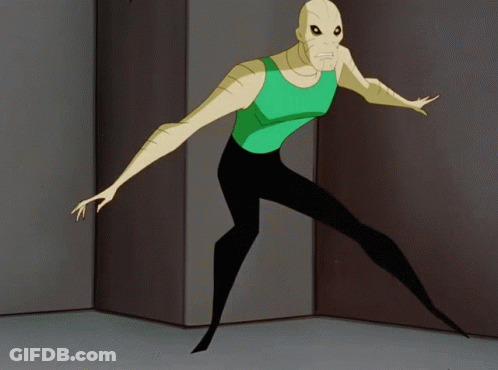 Cartoon Character In Green Tank Top And Black Pants Standing In Room GIF