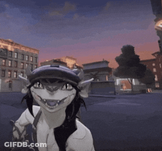 Cartoon Character In Hat Standing In Front Of Buildings GIF