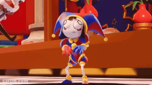 Cartoon Character In Jester Hat Dancing GIF