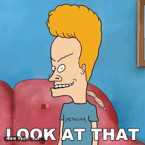 Cartoon Character In Metallica Shirt Sitting On Red Couch GIF