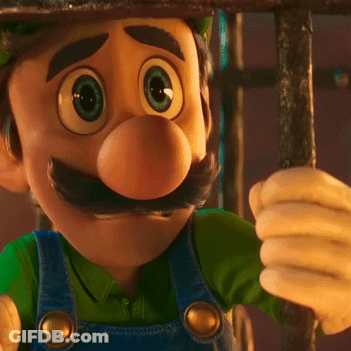 Cartoon Character In Overalls And Hat Close Up GIF