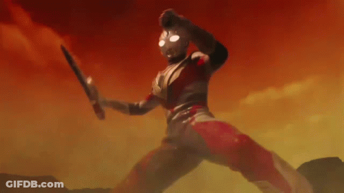 Cartoon Character In Red And Silver Holding Bat GIF