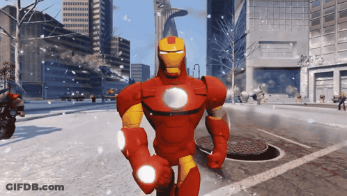Cartoon Character In Red And Yellow Iron Man Suit In Snowy City GIF
