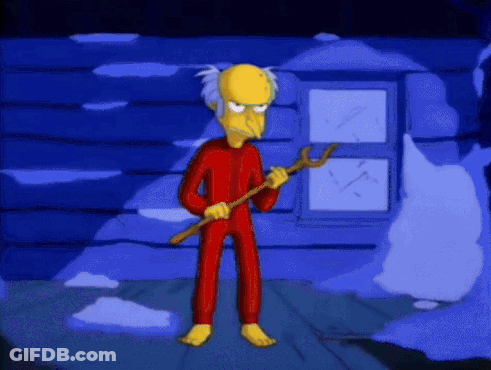 Cartoon Character In Red Pajamas Holding A Stick GIF