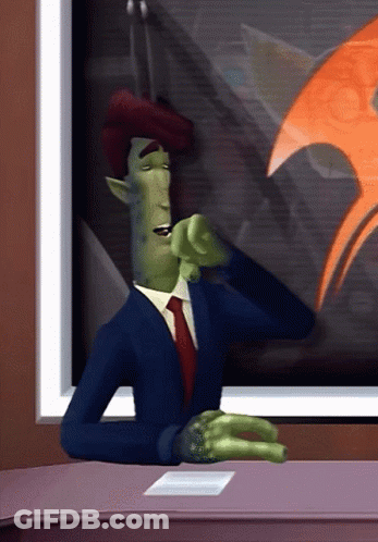 Cartoon Character In Suit And Tie Sitting At Table GIF