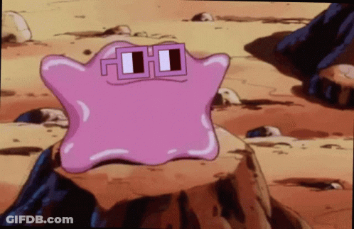 Cartoon Character In Sunglasses On Desert Rock GIF