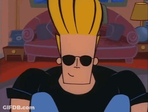 Cartoon Character In Sunglasses Sitting In Living Room GIF