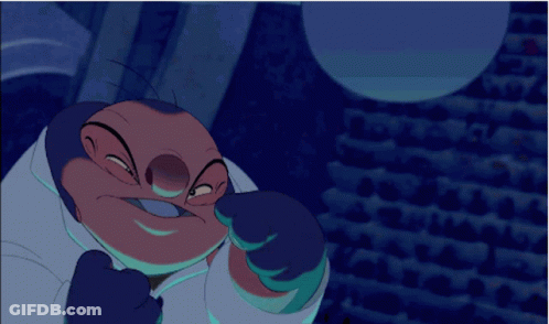 Cartoon Character In White Coat And Blue Glove GIF