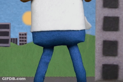 Cartoon Character In White Shirt And Blue Pants In City GIF
