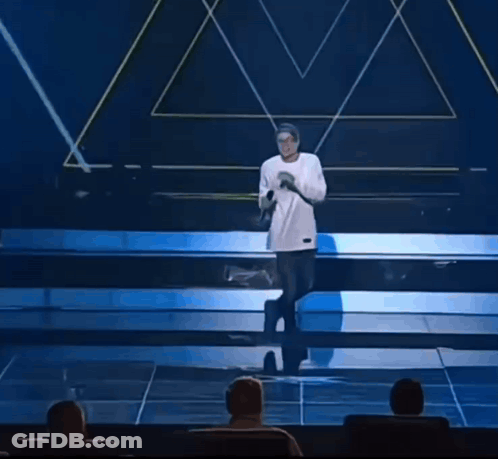 Cartoon Character In White Shirt And Blue Shorts GIF