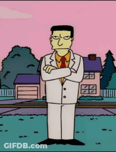 Cartoon Character In White Suit And Tie In Front Of House GIF
