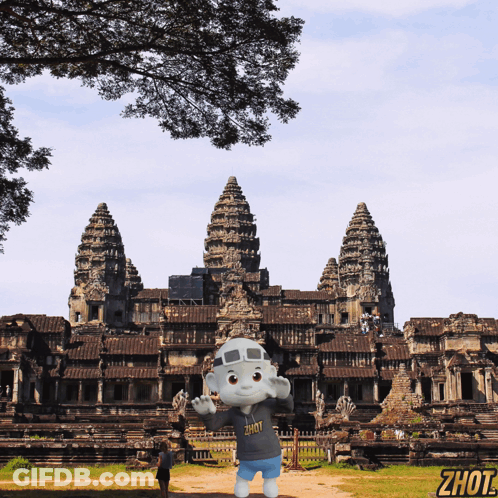 Cartoon Character In Zhot Shirt Before Old Building GIF