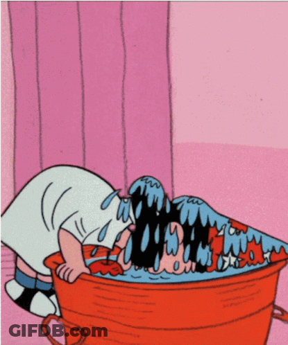 Cartoon Character Laying In Bucket Of Liquid GIF