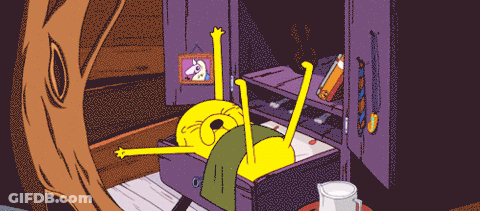 Cartoon Character Laying In Drawer With Unicorn Picture GIF