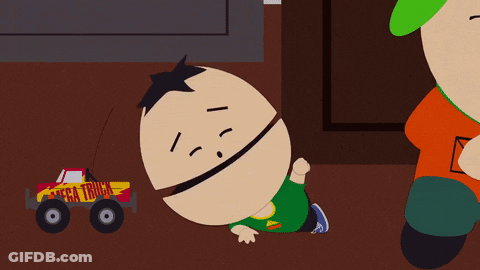 Cartoon Character Laying Next To Mega Truck GIF