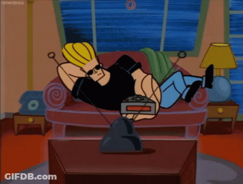 Cartoon Character Laying On Couch Watching TV GIF