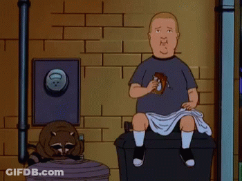 Cartoon Character Laying On Couch With Popcorn GIF